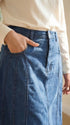 The pleated denim skirt