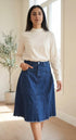 The pleated denim skirt