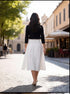 The pleated denim skirt